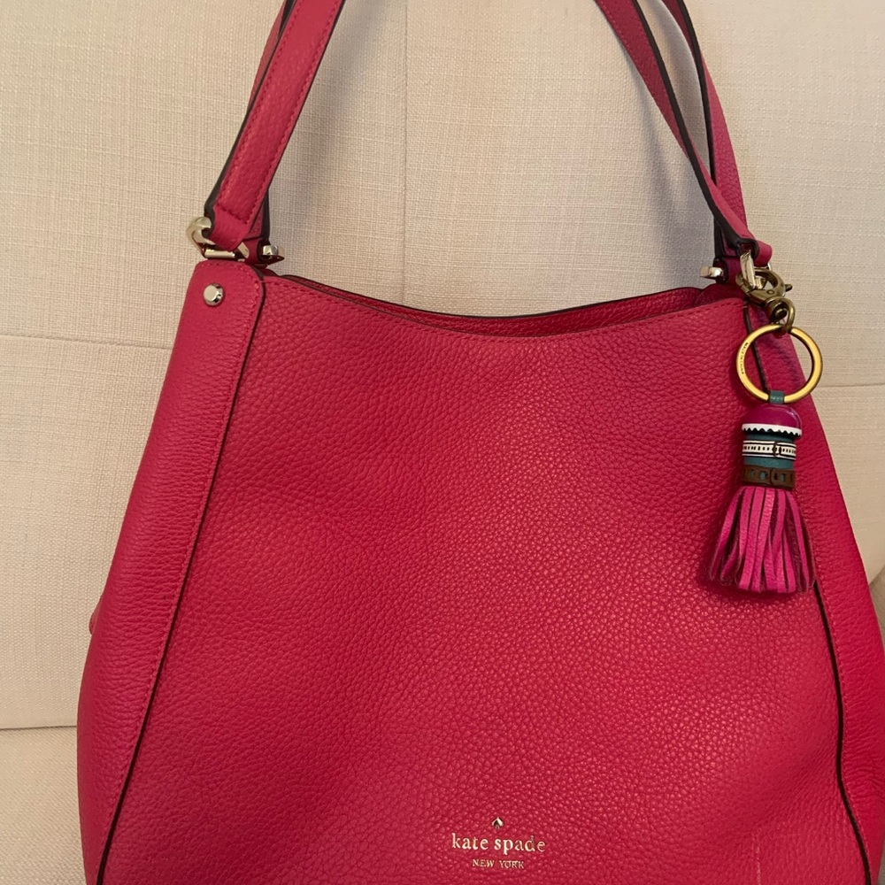 Kate Spade (authentic ). Hot pink.  NWT never used. Three divided sections.